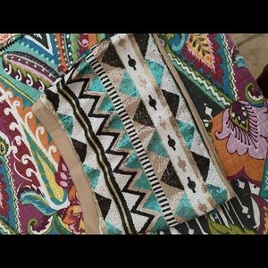 NEVER WORN. Too small.